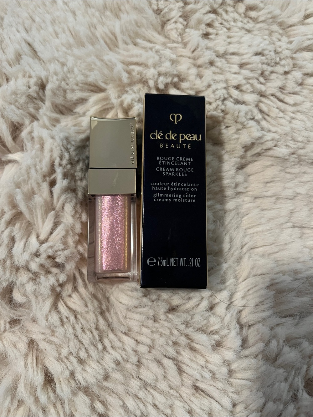 Cle De Peau Cream Rouge Sparkles in 303 Medinilla Magnifica